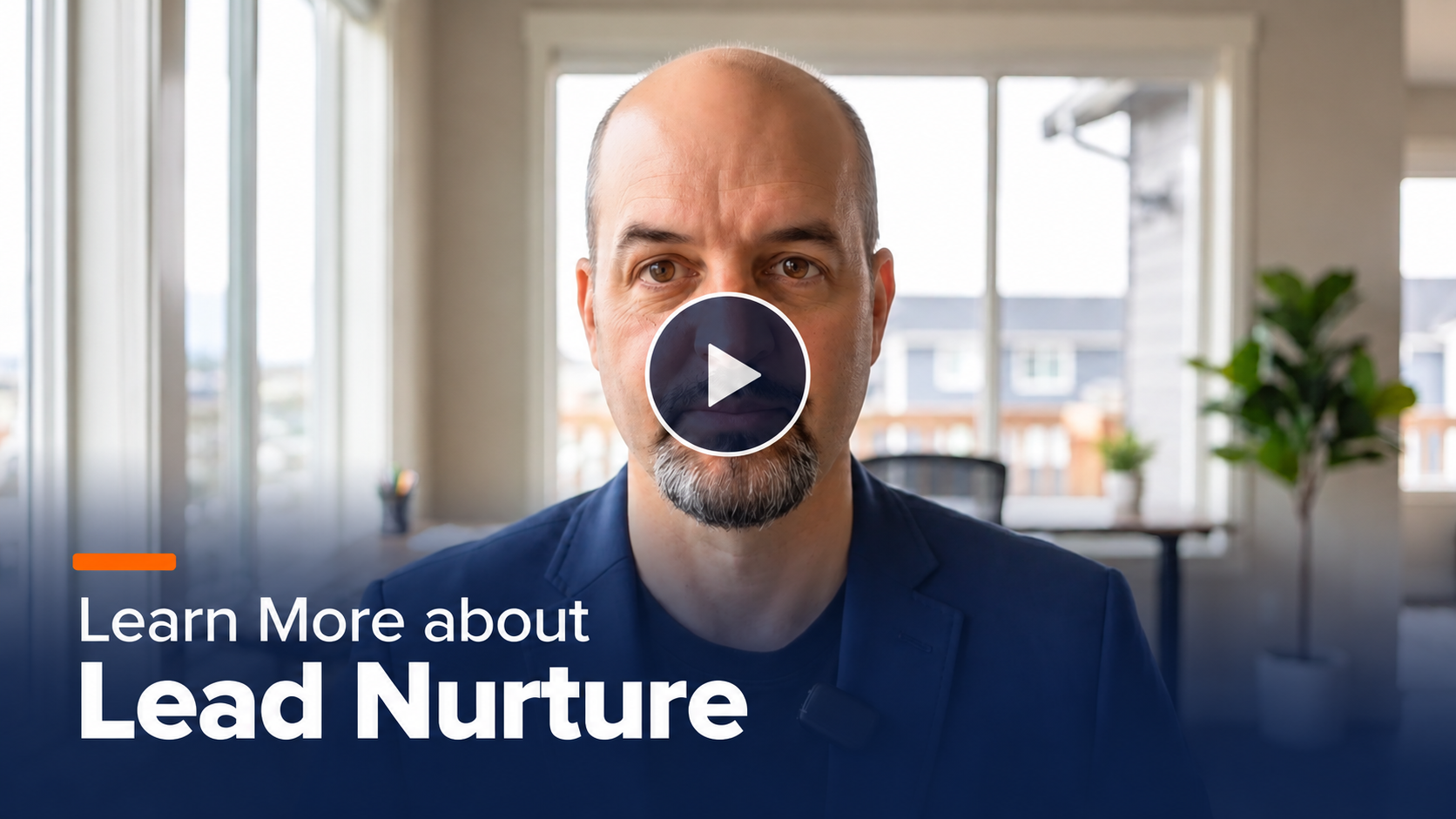 Video thumbnail: man in a blue blazer in a bright office, play button overlay, text 'Learn More about Lead Nurture' at the bottom left.
