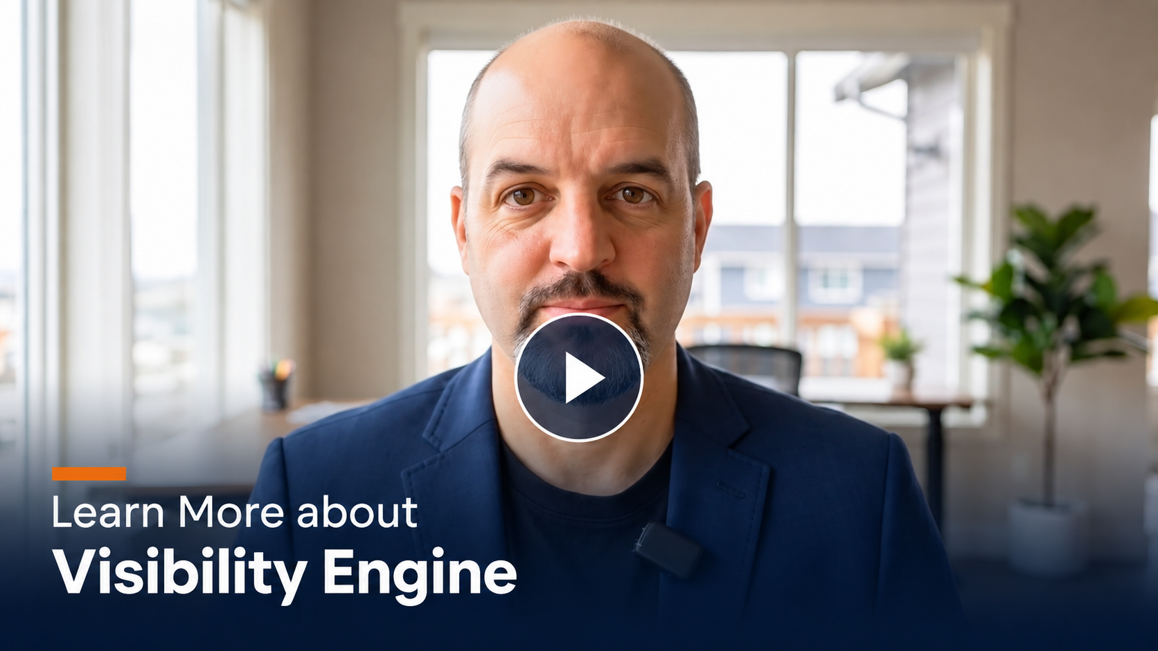 Video thumbnail: man in blue blazer speaking in an office, with a play button over his face and the text 'Learn More about Visibility Engine' in the corner.