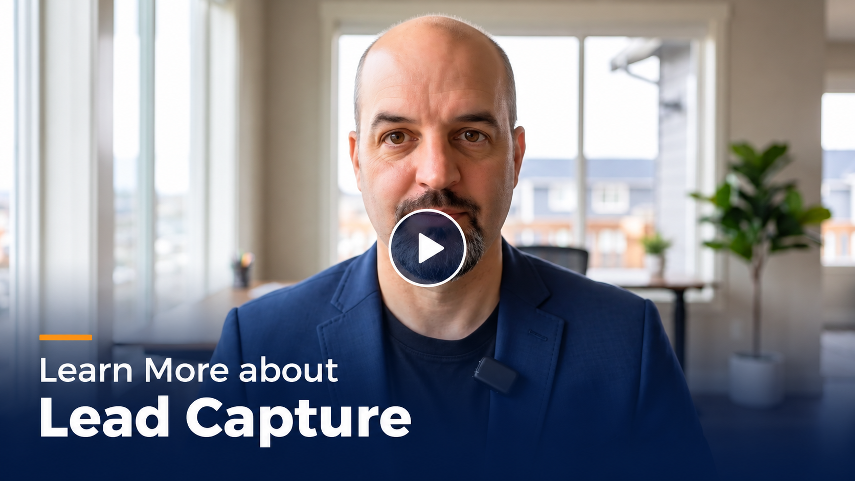 Video thumbnail: man in a blue blazer in a bright office, with a play button overlay and the headline 'Learn More about Lead Capture'